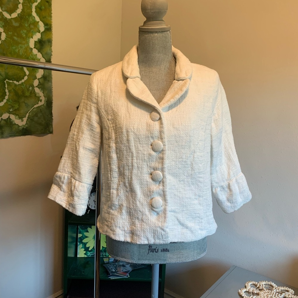 Merona white jacket. It is thick on the inside and is great for winter